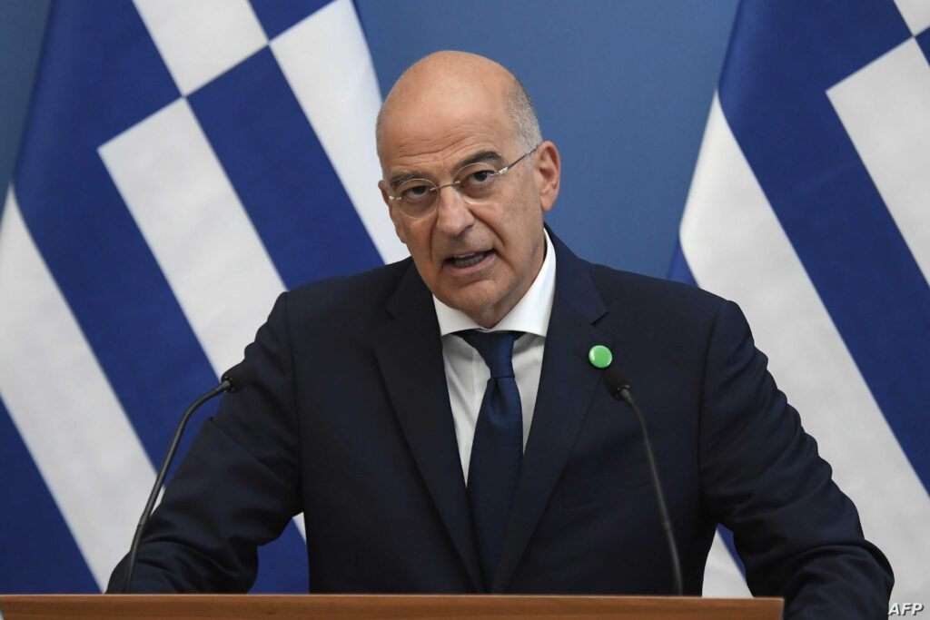 Greek Foreign Minister Nikos Dendias gives a joint press conference with the Hungarian Foreign and Trade Minister after a meeting in Budapest on October 2, 2020. (Photo by ATTILA KISBENEDEK / AFP)